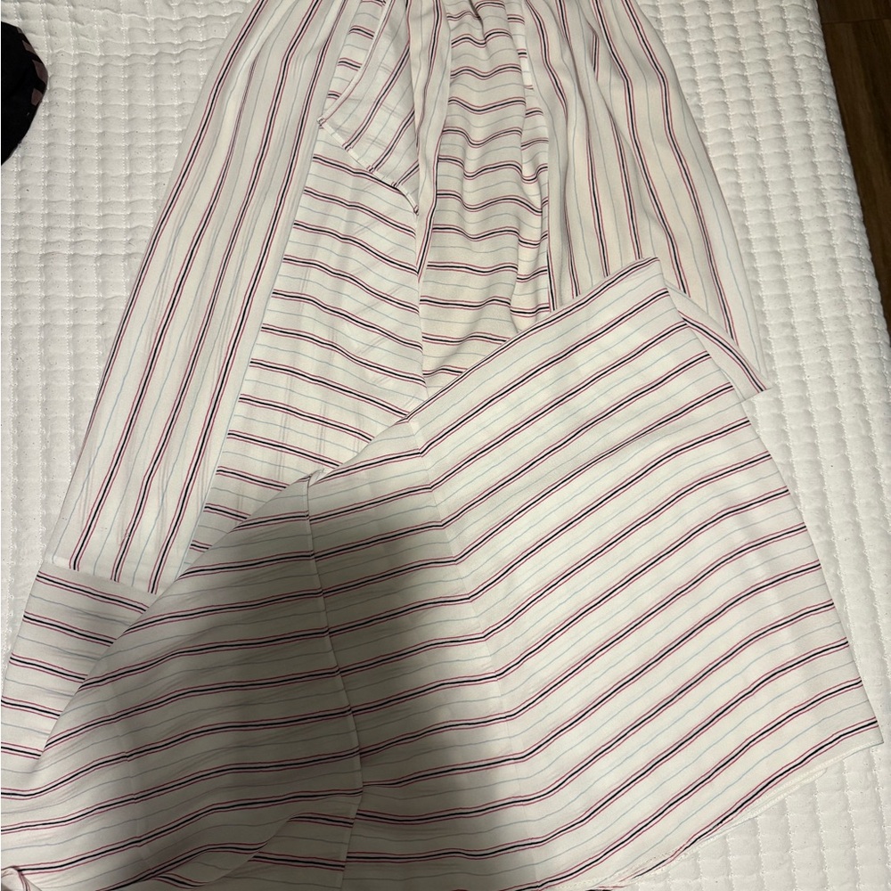 Colorful Patterned Clothing Stack - Picture 3 of 13